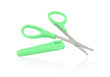Green scissors on white isolated background