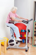 Senior Woman Exercising On Bike Senior Woman Exercising On Bike