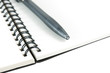 Book open pen on white isolated background