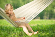 Adorable baby swing sitting in hammock