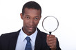 portrait of a man with magnifying glass