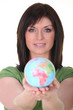 Woman with globe