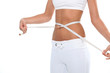 Woman measuring the waist