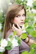 Outdoors portrait of beautiful young brunette girl