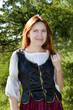Medieval woman near the fir Medieval woman near the fir
