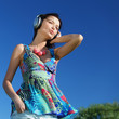Young woman enjoying music