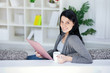 Beautiful woman writing in a notepad Beautiful woman writing in a notepad