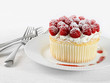 Cupcake with raspberries and cream Cupcake with raspberries and cream