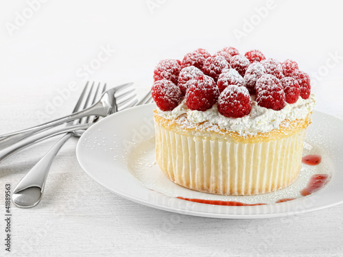 Photo: Cupcake with raspberries and cream Cupcake with raspberries and cream