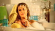 beauty woman playing with bubbles relaxing in bathroom