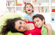 Happy mother and her children - motherhood