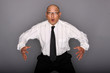 Surprised asian man wearing necktie.