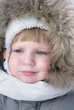 Cute boy in winter clothes