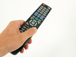 TV remote control and human hand