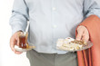 Young man serving turkish chai and sweets