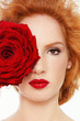 Photo: Woman with red rose Woman with red rose