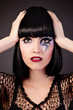 Beautiful woman with fashion makeup