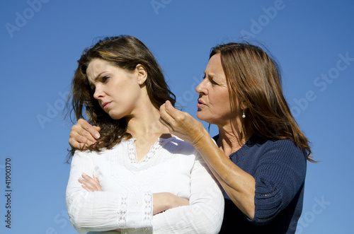Photo: Mother and daughter having a dispute or discussion Mother and daughter having a dispute or discussion