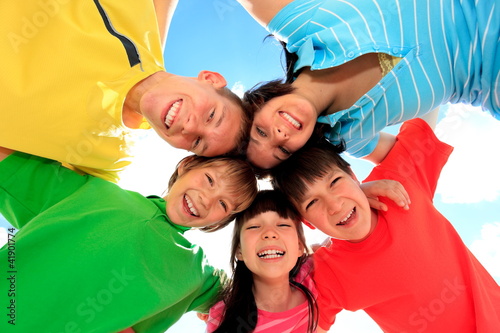 Photo: Happy children in circle Happy children in circle