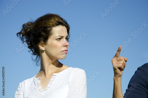 Photo: Pretty young woman facing accusation Pretty young woman facing accusation