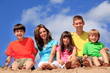 Happy children on beach sand