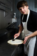 chef making pizza