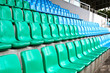 Green and blue stadium seats.