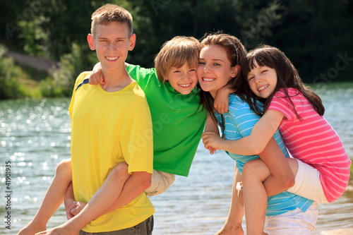 Photo: Happy children by lake Happy children by lake