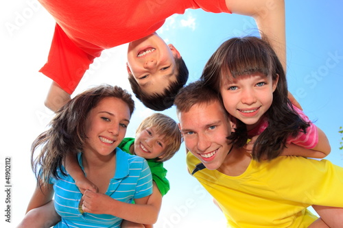 Photo: Five children looking down Five children looking down
