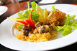 Thai food, rice in cold water served with fried sweet pork,fried