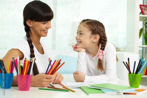 Photo: Girl with mother Girl with mother