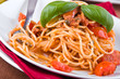 Spaghetti with tuna, cherry tomatoes and capers.