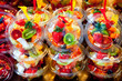 Colorful fruit salad in transparent glasses Colorful fruit salad in transparent glasses