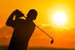 Foto: Photo of a Golfer in Sunset Photo of a Golfer in Sunset