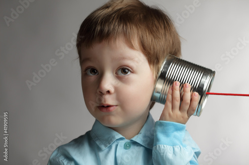 Photo: beauty boy listen tin can telephone beauty boy listen tin can telephone