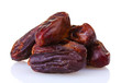 delicious dried dates isolated on white