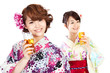 Beautiful kimono women drinking beer