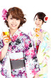 Beautiful kimono women drinking beer