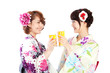 Beautiful kimono women drinking beer