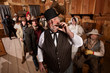 Photo: Tough Saloon Boss with Customers Tough Saloon Boss with Customers