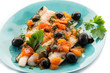 fish fillet with tomatoes balck olives and pepper