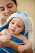Little baby boy in mother's arms