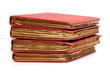 stack of old books with red covers