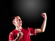soccer player in dark