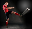 soccer player strikes