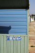 To Beach sign on huts at Ferring. West Sussex. UK
