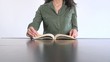 green shirt woman reading book
