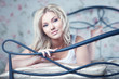Young woman in bed