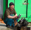 Photo: Locksmith washes the car engine before disassembly Locksmith washes the car engine before disassembly