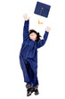 Boy throwing mortarboard